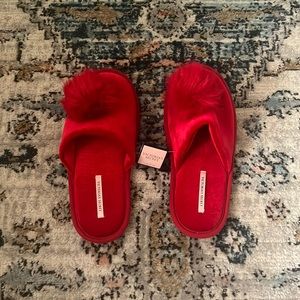 Victoria’s Secret red slippers.